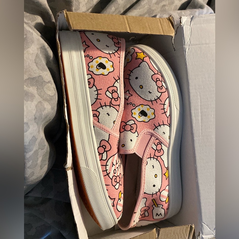 Hello kitty slide on shoes. Brand new in box.